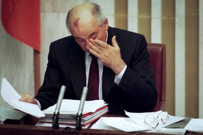 Then Soviet Union president Mikhail Gorbachev rubs his eyes, seemingly exhausted from the gruelling special session of the Supreme Soviet as he threatens to resign if his country falls apart in Moscow. AP Photo