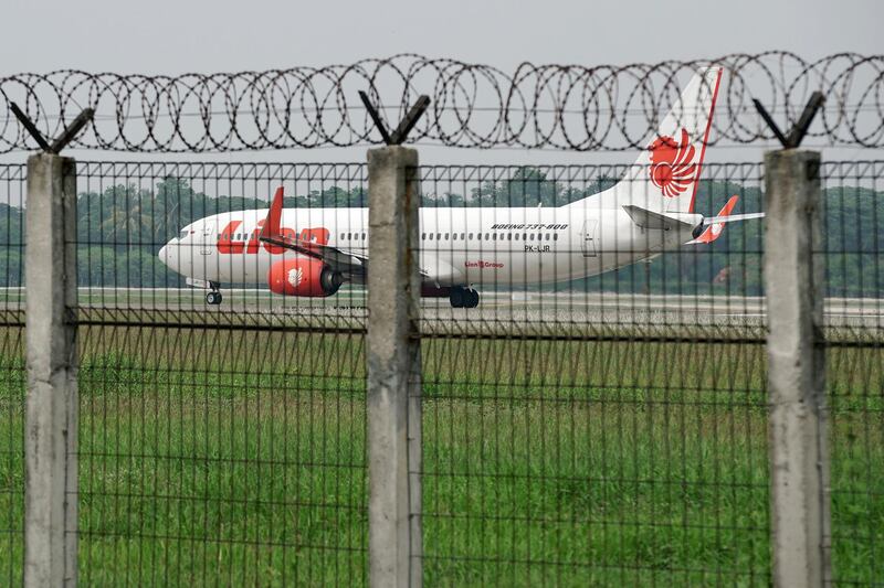 A Lion Air Group aircraft travels along a runway at Soekarno-Hatta International Airport in Cengkareng, near Jakarta, Indonesia, on Tuesday, Dec. 11, 2018. Lion Air's owner Rusdi Kirana is sketching out plans to become one of the world's largest budget carriers, while also preparing to scrap $22 billion in Boeing Co. jet orders out of anger at the manufacturer's response to an October air disaster. Photographer: Dimas Ardian/Bloomberg