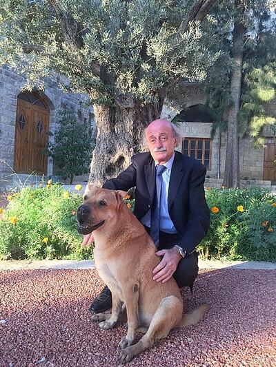 Lebanese Druze leader Walid Jumblatt with his favourite dog Oscar, which had died earlier this year.