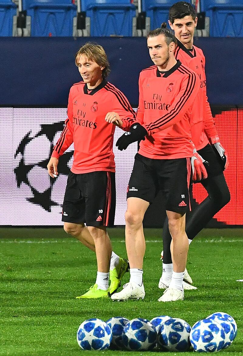 Luka Modric, Gareth Bale and Thibaut Courtois take part in a training session. AFP