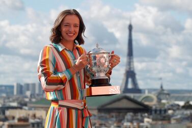 Tennis - French Open - Galeries Lafayette Rooftop, Paris, France - October 11, 2020 Poland's Iga Swiatek poses with the trophy after winning the French Open yesterday REUTERS/Charles Platiau TPX IMAGES OF THE DAY