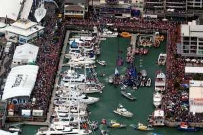 AUCKLAND - MARCH 2:  The Viaduct Harbour celebrations for Alinghi after winning the America's Cup between Team New Zealand and Alinghi of Switzerland on the Hauraki Gulf, Auckland, New Zealand on March 2, 2003. Alinghi beat Team New Zealand by 45 seconds to win the best of nine series 5-0. (Photo by Rick Tomlinson/Getty Images)