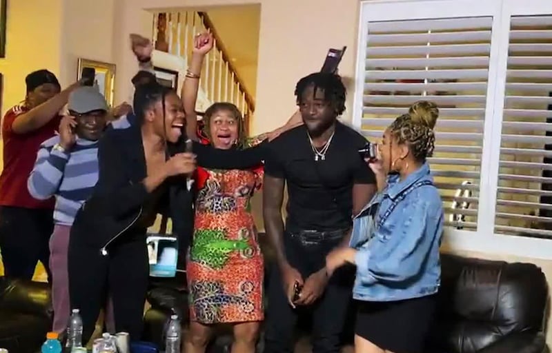 Brandon Aiyuk, second from right, is congratulated after being selected by San Francisco 49ers during the NFL draft. NFL / USA TODAY