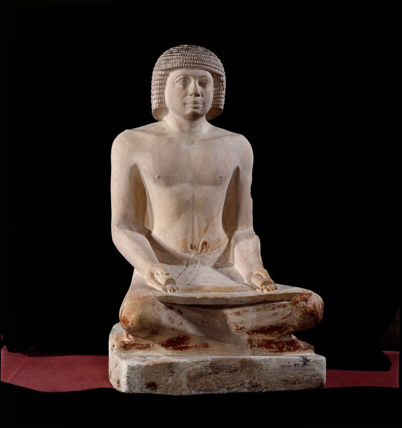 The limestone statue of a scribe dating back to ancient Egypt's Sixth Dynasty will also be on display. Photo: Musee du Louvre