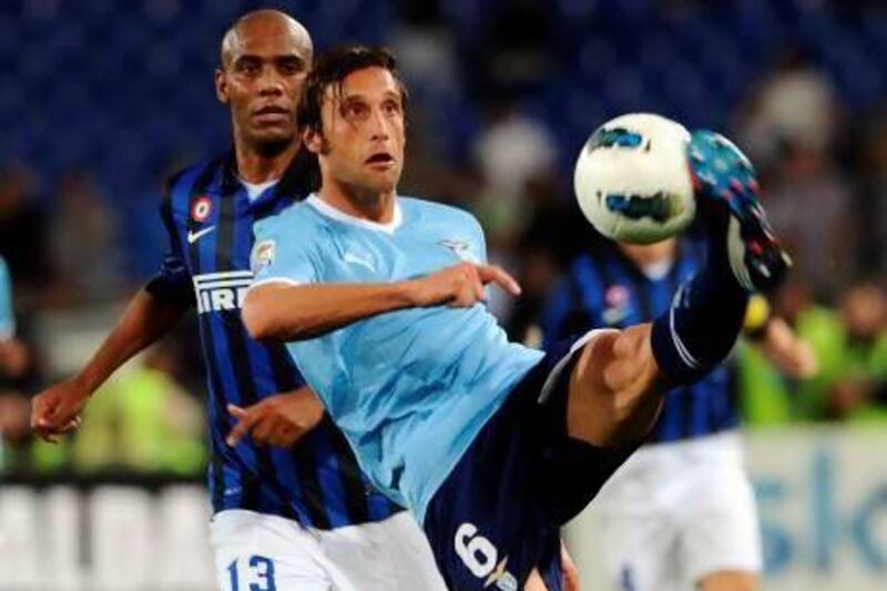 The Lazio captain Stefano Mauri, front, says he will 'put his trust' in the appeals process as he looks to overturn the FIGC's six-month suspension for failing to report his knowledge of match-fixing in May 2011. Gabriel Bouys / AFP