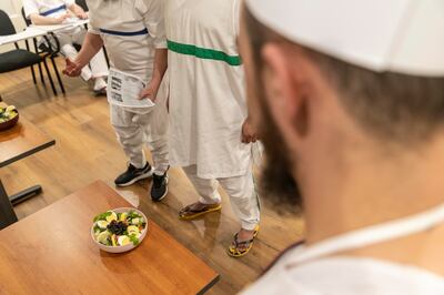 Inmates at Dubai Central Jail present one of their dishes. Antonie Robertson / The National