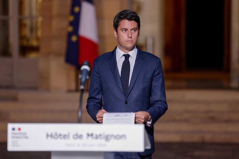 France's Prime Minister Gabriel Attal arrives to give a speech following the announcement of the results in Paris. AFP