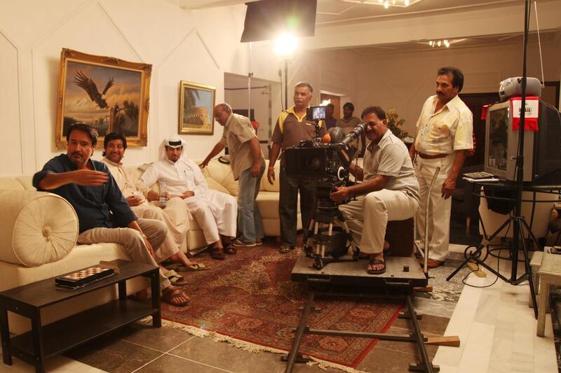Majid Abdulrazak, left, on the set with the cast and crew of Bani Adam, his third film. Courtesy M A Film Productions