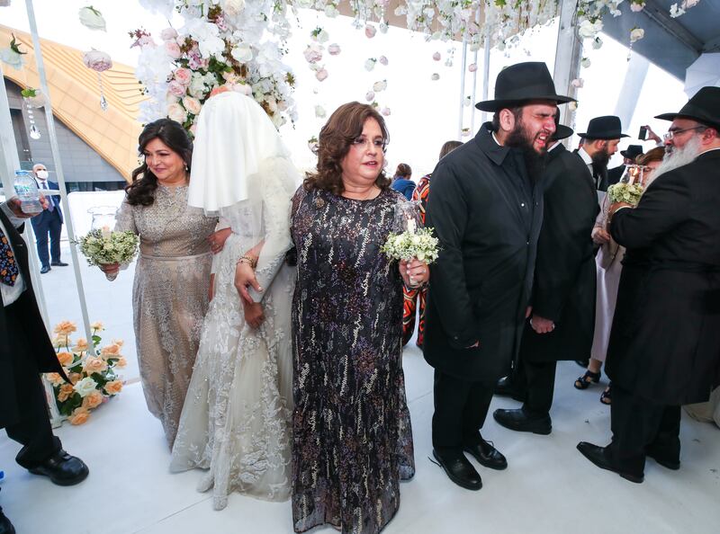 Ms Hadad, centre, with her mother and mother-in-law. 