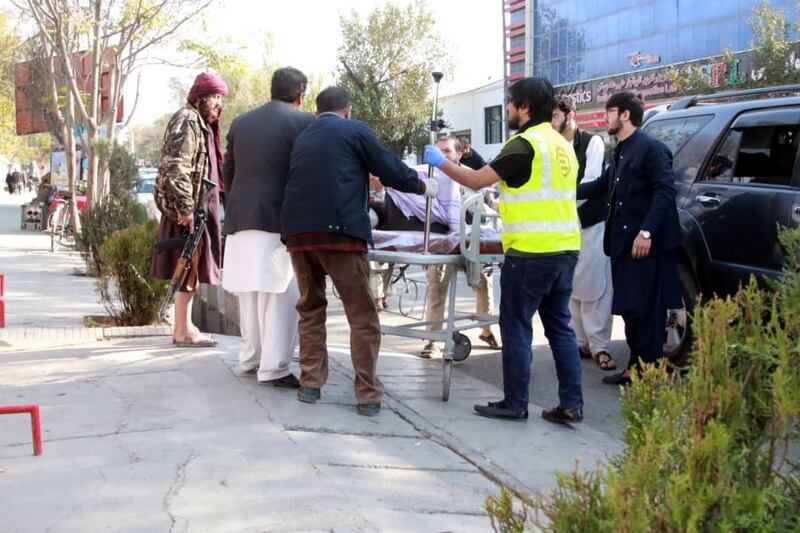 Surviving blast victims are moved to an emergency hospital in the Afghan capital for treatment. EPA