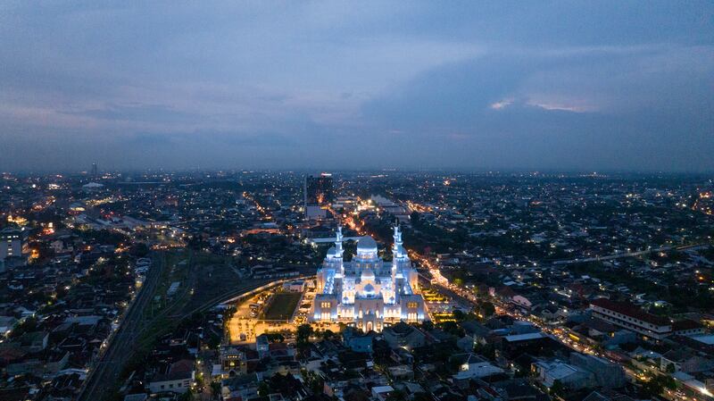 An aerial photograph of the Sheikh Zayed Grand Mosque.