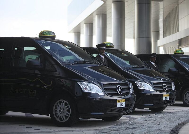 Offering card payment in taxis means passengers do not have to change their money into dirhams as soon as they land at the airport. Lee Hoagland / The National