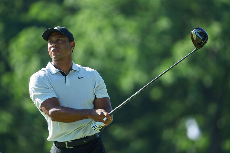 Tiger Woods watches a tee shot during a practice round prior to the start of the 2022 PGA Championship. Getty