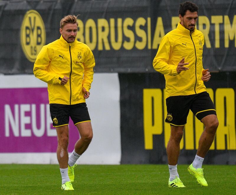 Dortmund's German defenders Marcel Schmelzer and Mats Hummels take part in a training session. AFP