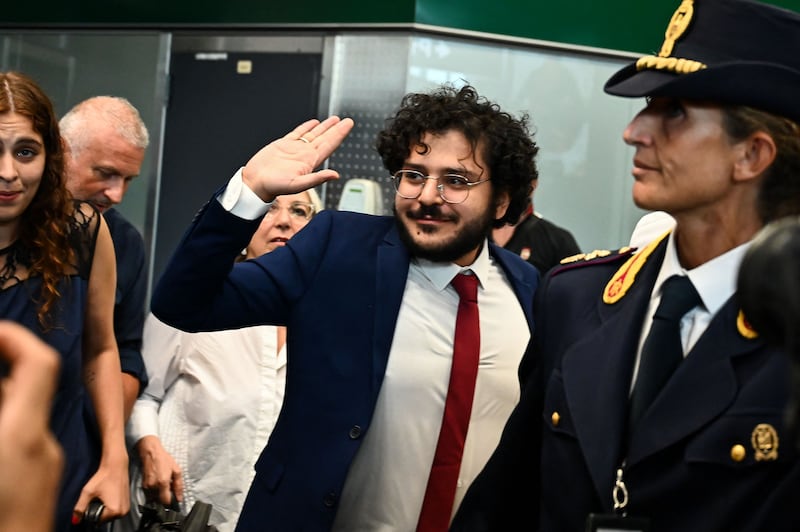 Egyptian activist Patrick Zaki arrives at Milan Malpensa Airport following his release from detention. AFP