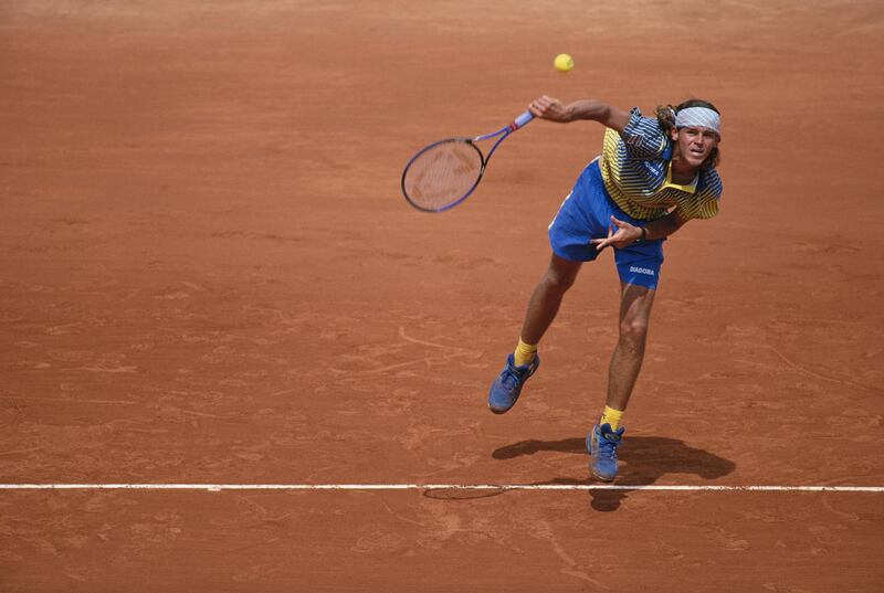 6 Jun 1997:  Gustavo Kuerten of Brazil serving during a match in the French Open at Roland Garros in Paris, France.  \ Mandatory Credit: Gary M Prior/Allsport