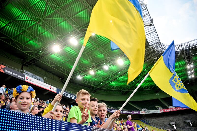 Borussia Moenchengladbach fans and Ukraine supporters stand united ahead of the benefit football match between Borussia Moenchengladbach and the national team of Ukraine. EPA