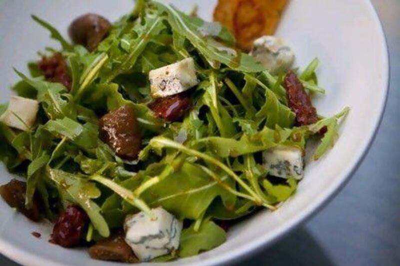 Arugula, gorgonzola, fig and walnut salad is a beauty of a summer dish.