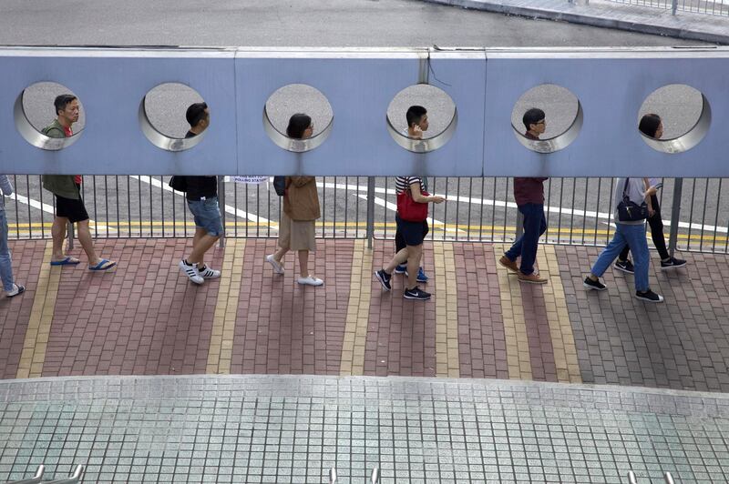 Long lines formed outside Hong Kong polling stations. AP Photo