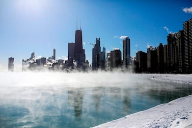 TOPSHOT - Steam hovers above Lake Michigan as temperatures dropped to -20 degrees F (-29C) on January 30, 2019 in Chicago, Illinois. Frostbite warnings were issued for parts of the US Midwest on January 30, 2019, as temperatures colder than Antarctica grounded flights, forced schools and businesses to close and disrupted life for tens of millions. / AFP / JOSHUA LOTT