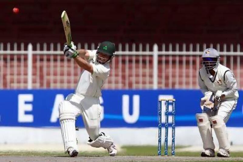 Ireland batsman Edmund Joyce, left, plays a shot during a ICC Intercontinental Cup match against UAE at the Sharjah Cricket Stadium in Sharjah yesterday. Satish Kumar / The National