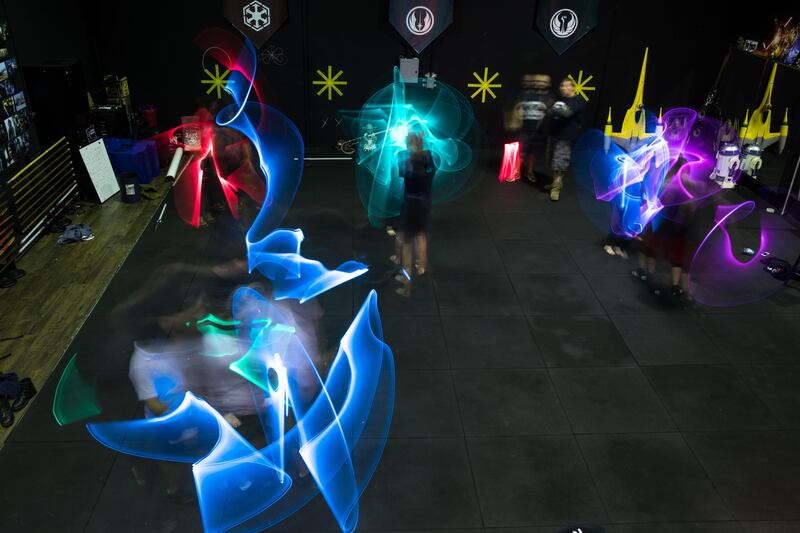 A class use Saberdyne sabers as they take part in a lesson at the Sons of Obiwan Saber Academy in Sydney, Australia. All photos by Mark Kolbe / Getty Images