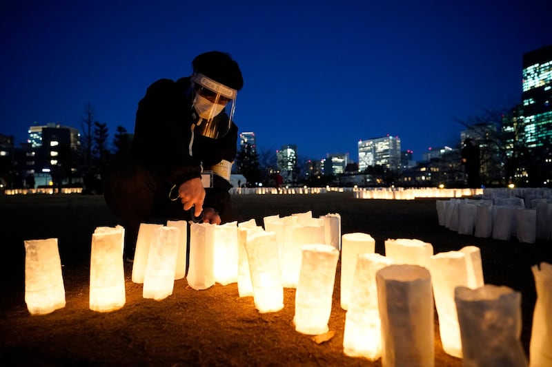 Paper lanterns are lit to mark the 10th anniversary of a devastating earthquake and tsunami that struck Japan. EPA