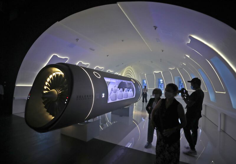 Zeleros premieres its hyperloop vehicle during a media tour of the Spain Pavilion. AP Photo