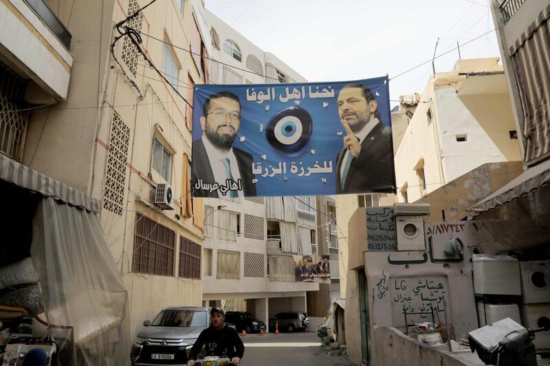 A picture taken on April 3, 2018 shows campaign poster for Lebanese Prime Minister Saad Hariri, for the upcoming Lebanese parliamentary election, hanging in the Tariq Jedideh district of Beirut.
As its first parliamentary vote in nearly a decade nears, Lebanon has been swept into campaign fever: posters on every corner, televised debates, and neighbours bickering over new electoral procedures. / AFP PHOTO / AFP- / Anwar AMRO