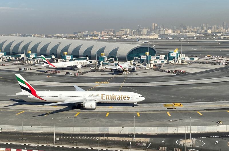 Emirates airliners are seen on the tarmac of Dubai International Airport on January 13, 2021. Reuters