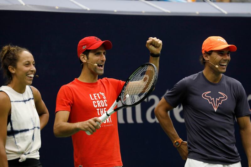 epa06972648 (L-R) Tennis players, Madison Keys, Novak Djokovic and Rafael Nadal participate at the '2018 Arthur Ashe Kids Day' at the 2018 US Open Tennis Championships at the USTA National Tennis Center in Flushing Meadows, New York, USA, 25 August 2018.  EPA/PETER FOLEY