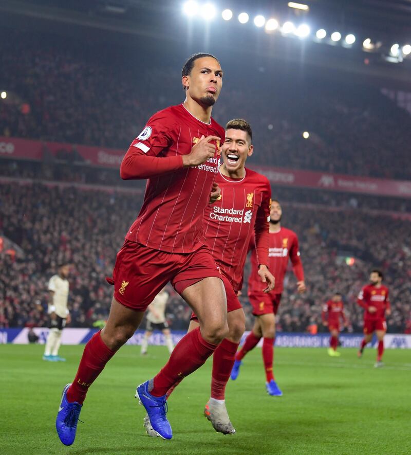LIVERPOOL, ENGLAND - JANUARY 19: Virgil van Dijk of Liverpool scores to make it 1-0 during the Premier League match between Liverpool FC and Manchester United at Anfield on January 19, 2020 in Liverpool, United Kingdom. (Photo by Michael Regan/Getty Images)