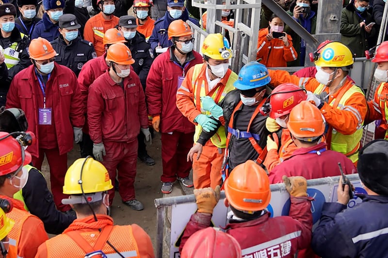 The miners had been trapped for two weeks after a gold mine explosion. AFP