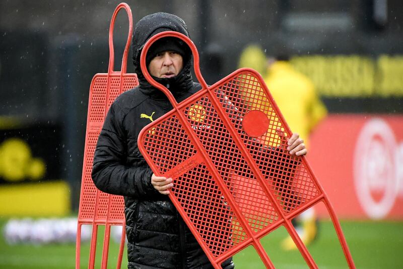 Dortmund's head coach Lucien Favre sets up training. EPA