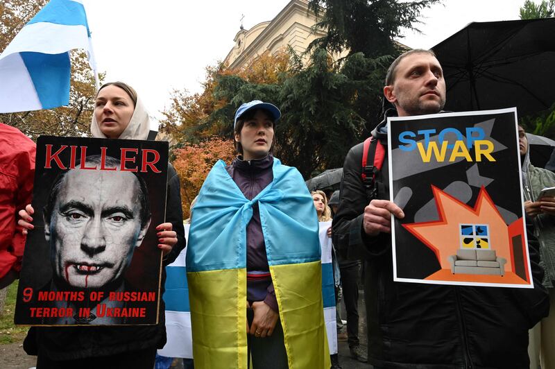 Protesters rally to condemn Russian strikes on Ukraine during an event organised by Russian emigrants and activists, in Tbilisi, south-east Georgia, on November 26, 2022. AFP