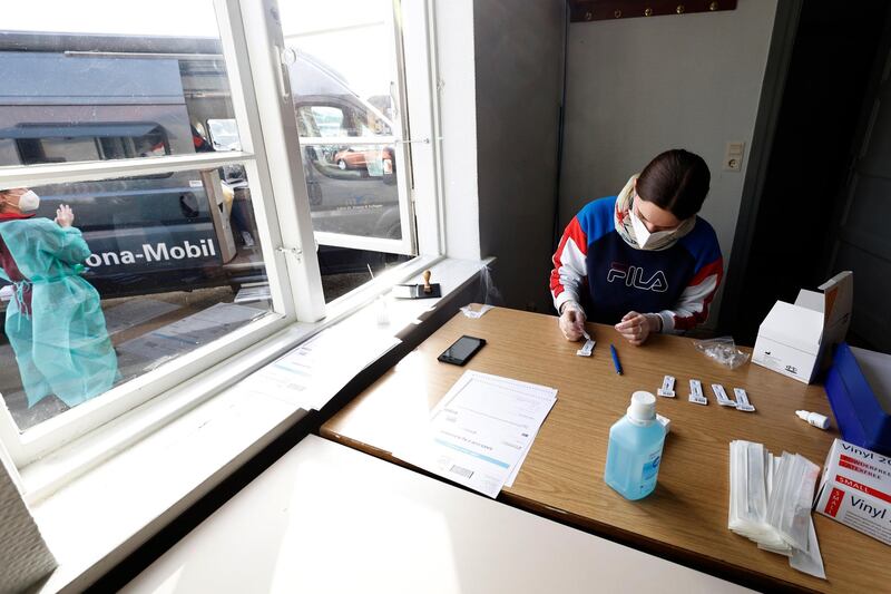 A laboratory assistant works on antigen rapid tests in Flensburg, Germany. The B117 variant of coronavirus is now accounting for the vast majority of new infections in Flensburg. Getty Images