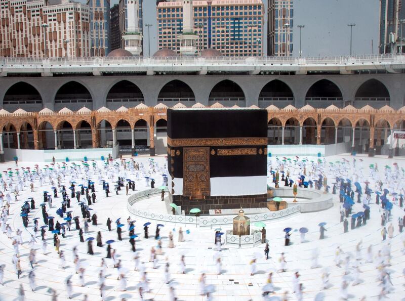 Pilgrims circle around the Kaaba at the Masjidil Haram, Islam's holiest site, during the Tawaf Al Qudum (Tawaf of Arrival) on the first day of Hajj 2020. EPA