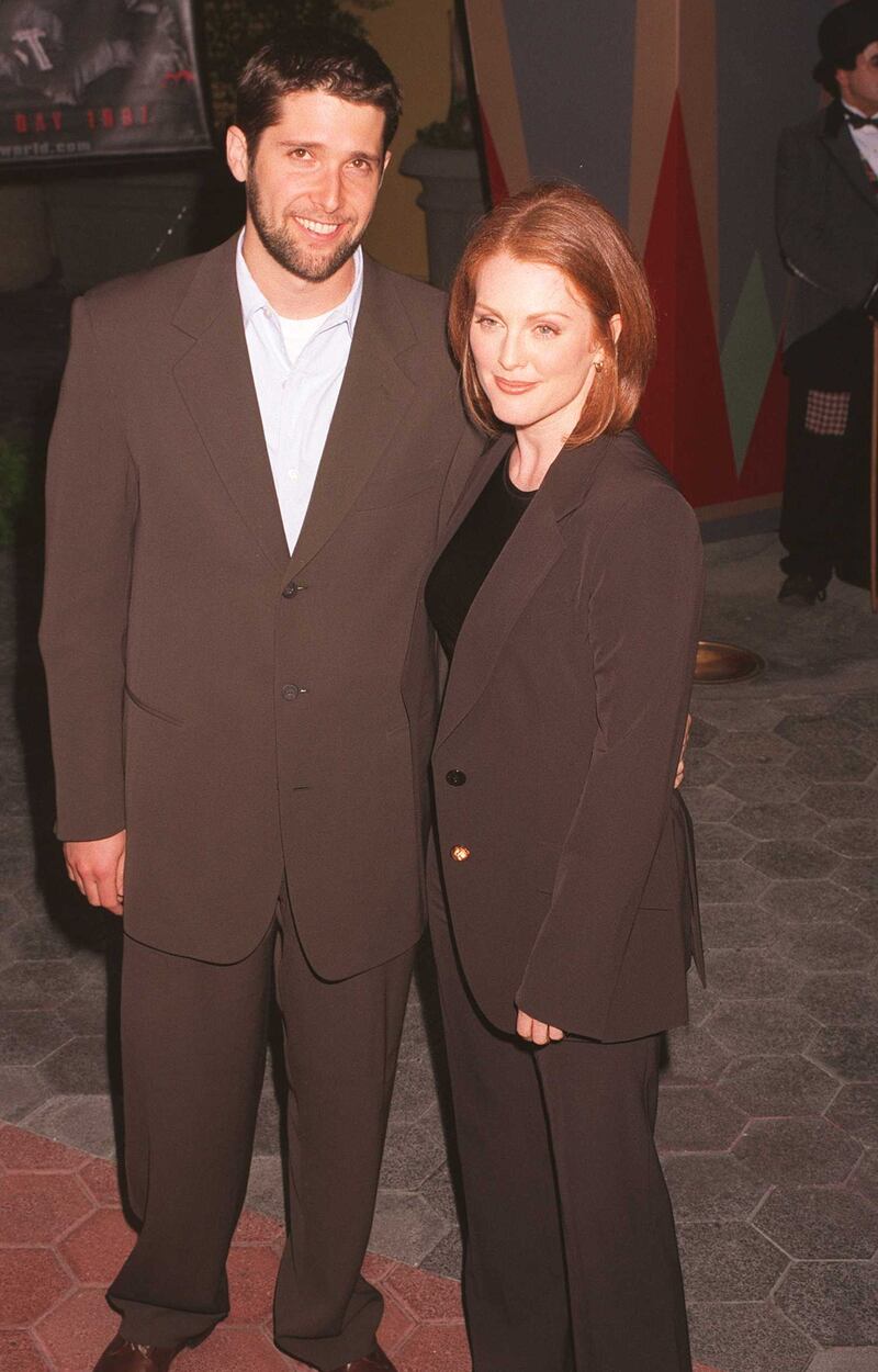 Julianne Moore, in a brown suit, attends a screening of 'Lost World' in Los Angeles, California, on May 20, 1997. Getty Images