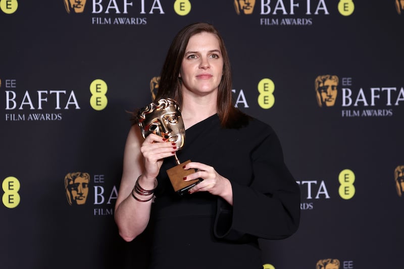 Jennifer Lame with the Bafta Best Editing award for Oppenheimer. Getty Images