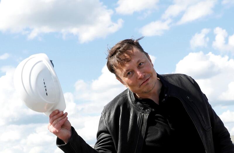 SpaceX founder and Tesla CEO Elon Musk holds a helmet as he visits the construction site of Tesla's gigafactory in Gruenheide, near Berlin, Germany, May 17, 2021. REUTERS/Michele Tantussi