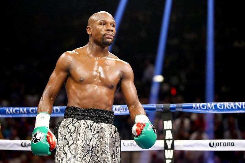 Floyd Mayweather ($915m)  - He has held multiple world titles in five weight classes and "retired" with an undefeated record (50-0), although has talked of a comeback. Mayweather has generated approximately 24 million PPV buys and $1.67 billion in revenue throughout his career. Topped more than $500m in earnings for his 2015 and 2017 fights against Manny Pacquiao and Conor McGregor. AFP
