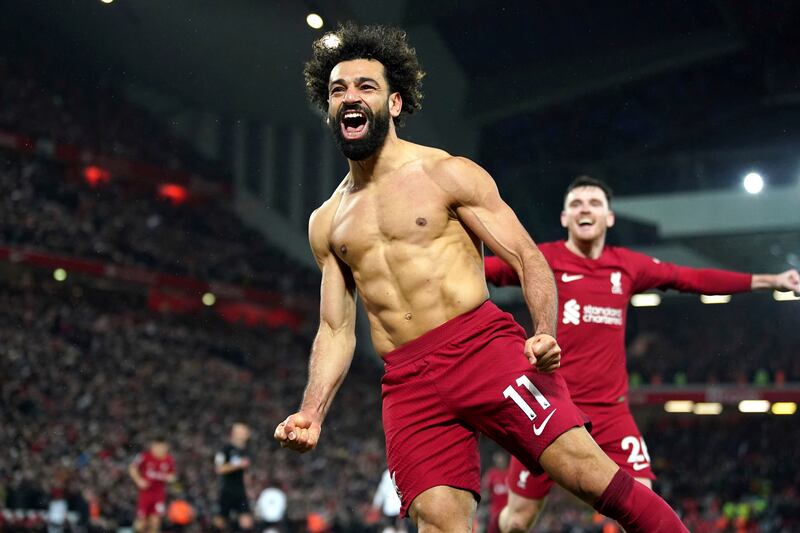 Liverpool's Mohamed Salah celebrates after scoring his second goal against Manchester United at Anfield. AP