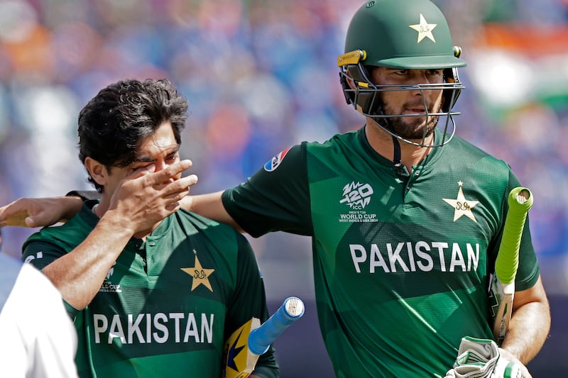 Pakistan's Shaheen Afridi, right, consoles Naseem Shah after their six-run defeat in New York. AP