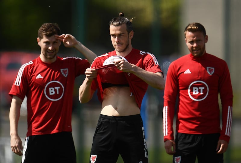 Left to right: Ben Davies, Gareth Bale and Chris Gunter. Getty