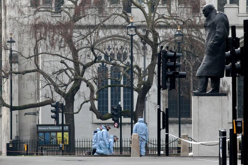 British police officers work at the scene of the attack at the Houses of Parliament in London on March 23, 2017. Jack Taylor / Getty Images