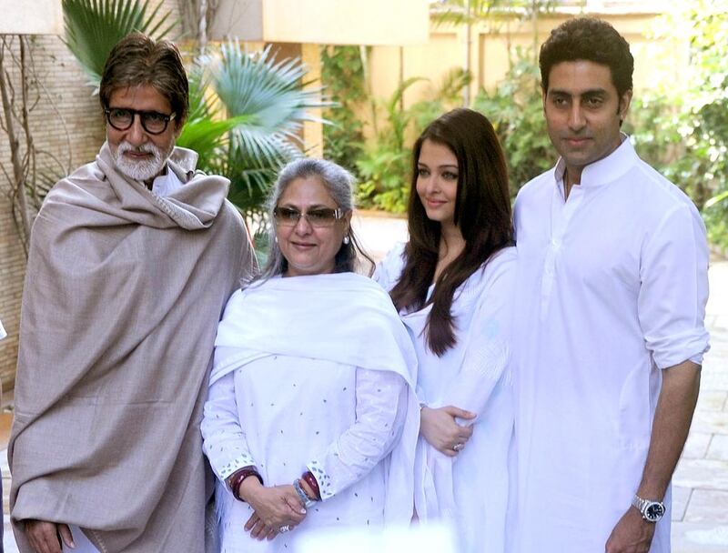 Aishwarya Rai Bachchan with her husband Abhishek Bachchan, far right, Amitabh Bachchan, far left, and Jaya Bachchan. Indranil Mukherjee / AFP photo



