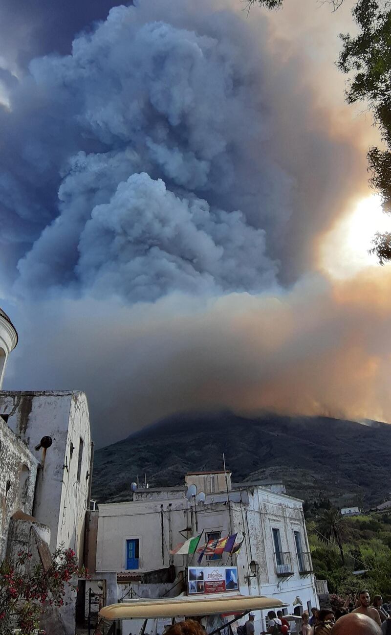 Ash rises into the sky after a volcano eruption on a small island of Stromboli, Italy. According to reports, the island of Stromboli was hit by a set of violent volcano eruptions spurring beach tourists to take into the sea. Two new lava spouts are creeping down the volcano. EPA