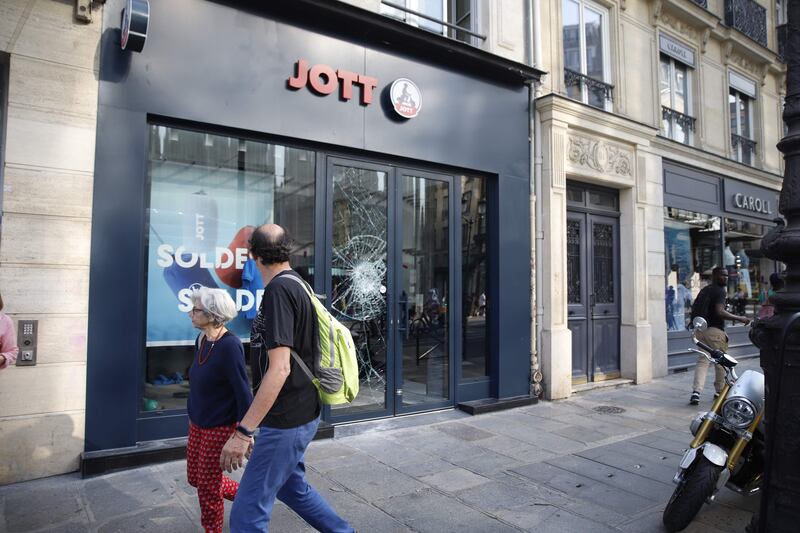 A damaged store front in Paris. AFP