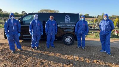 Workers of the Ghousia Funeral Service pictured in personal protective equipment at the Vale Cemetery in Luton during the coronavirus pandemic. Courtesy Ghousia Funeral Service 