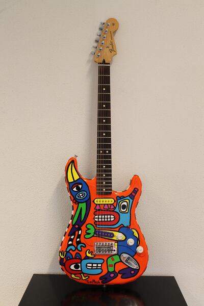 A Fender guitar emblazoned with designs by Ton Pret. Courtesy Ton Prêt